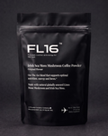 A black stand-up pouch of FL16 Irish Sea Moss Mushroom Coffee Powder, Original Flavour, photographed against a dark gray background.