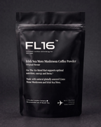 A black stand-up pouch of FL16 Irish Sea Moss Mushroom Coffee Powder, Original Flavour, photographed against a dark gray background.